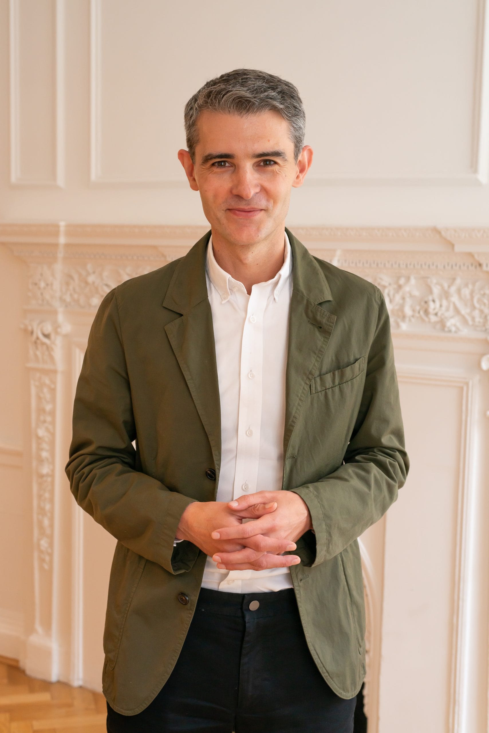 Image: Callum Lee, BOP Consulting's Managing Director, standing in the BOP offices