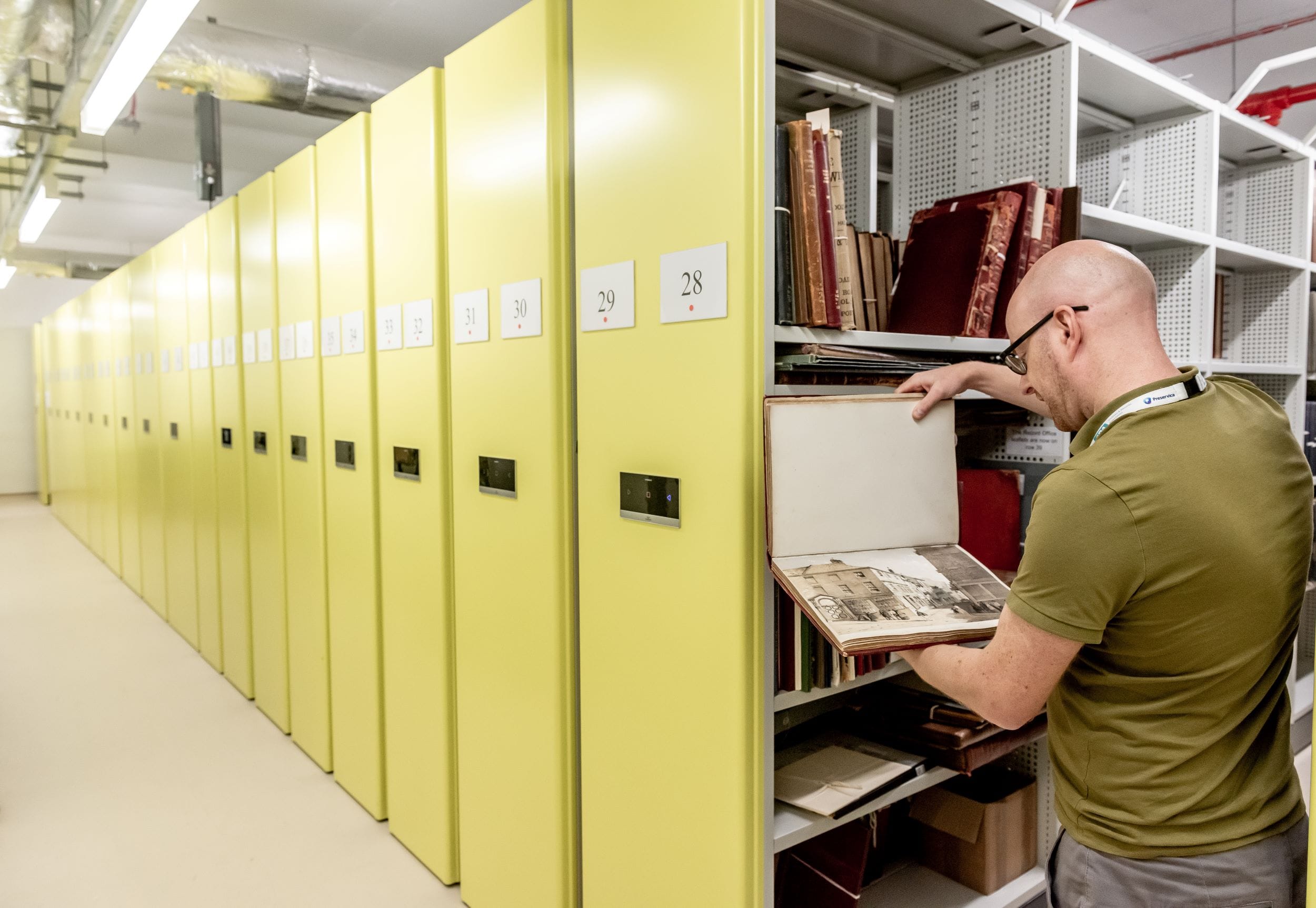 Image: Archivist in the archive stacks at the National Archives, courtesy of the National Archives
